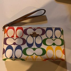 Rare and hard to find, coach pride white wallet!